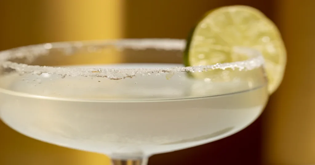 A group of friends toasting with margaritas on National Margarita Day.