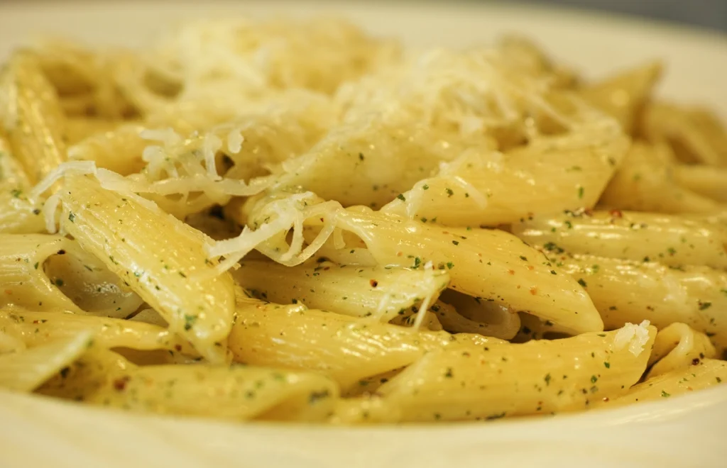 Barilla Protein Pasta served with a hearty tomato sauce and vegetables.