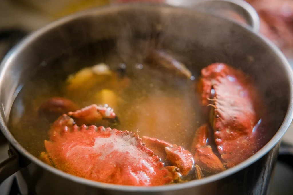 A baking dish filled with stuffed crab ready to be served.